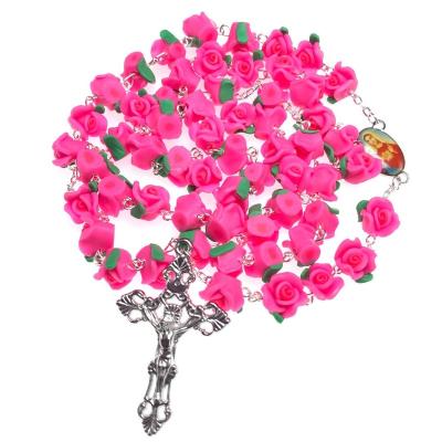 China The most popular style religious dark pink soft clay flower catholic rosary rose centerpiece cross pendant and rosario Virgin Mary Jesus for sale