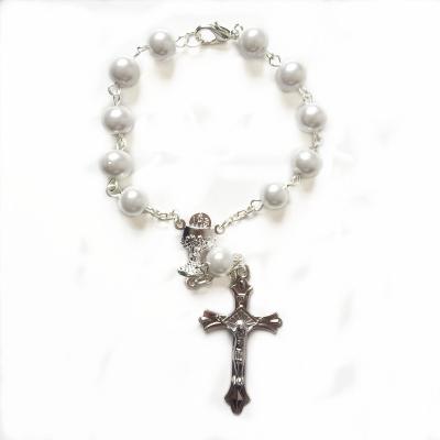 China Religious white round glass beads rosary bracelets, religious rosary bracelets with alloy saint chalice center and Jesus cross for sale