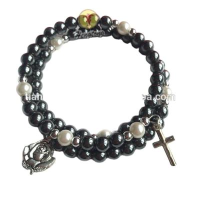 China Fashion Bracelets Factory Manufacturer Catholic Round Hematite Beads Bracelet With Alloy Cross And Rose Row Pendant Bracelets for sale