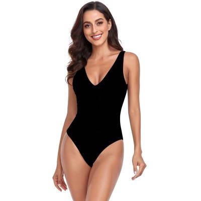 China Plus size 2023 women's sexy backless sexy backless solid color European and American wear one-piece swimsuit new style V-neck 2023 size beach swimwear bikini for sale