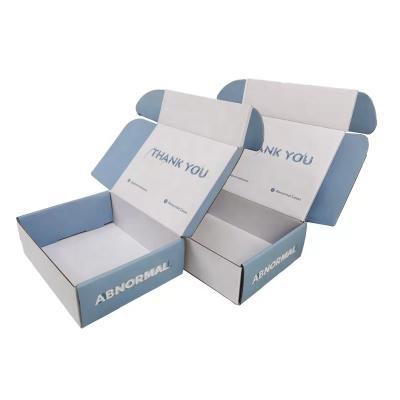 China Recyclable Modern White Blue Corrugated Soft Light Package Box For Paper Toy Box Storage Packaging for sale