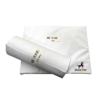 China A film + B film in roll new A3 A4 UV PET dtf transfer film for digital inkjet printer for sale