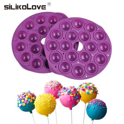 China Sustainable Household Personalized 18 Cavity Maker Purple Round Ball Lollipop Silicone Bakeware With Silicone Handle for sale