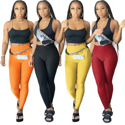 China Fashion popular QUICK DRY hip jacquard yoga lifting pants, sports hip showing cuffs, fitness pants for sale