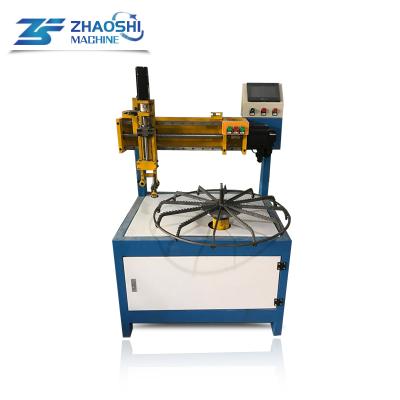 China Factory Automatic Fan Cover Net Spiral Coiling Industrial Fan Guard Machine Fan Guard Winding Machine for sale