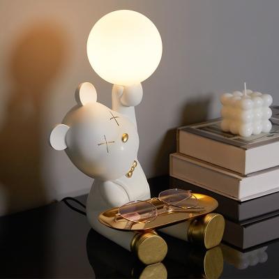 China 2022 Modern New Modern Design Indoor Hotel Bedside Kids Personality Resin Animal Auspicious Table Lamp With Phone Pen Mobile Holder for sale