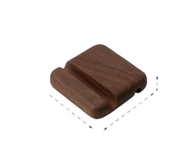 China Convenient Mini Desktop Mobile Phone Holder Cell Phone Whole Wooden Solid Wood Portable Base for sale