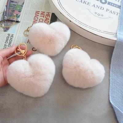 China Custom Puffball Key Chain Eco-Friendly Logo Car Puff Ball Heart Pom Pom Furball Pink Fur Plush For Women for sale