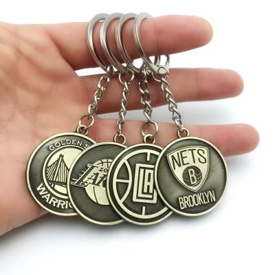 China Antique Copper Blanks Designer Accessories Car Football Eco-Friendly Custom Basketball Team Logo Metal Keychain for sale