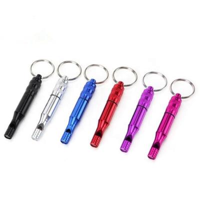 China Outdoor Camping Hiking Black Stainless Steel Removable Whistle Pocket Emergency Rescue Whistle With Capsule for sale