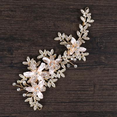 China Zhejiang fashion bridal headwear wedding dress hair accessories soft high quality handmade crystal comb for sale