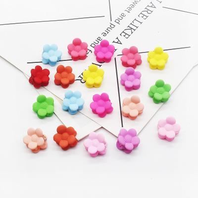 China Hot-selling frosted cute striking flower shape jewelry hairpin chuck Zhejiang decoration small baby geometric cartoon kids claw for sale