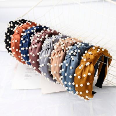 China Decoration hot selling simple European and American nail pearl knotted headband for sale