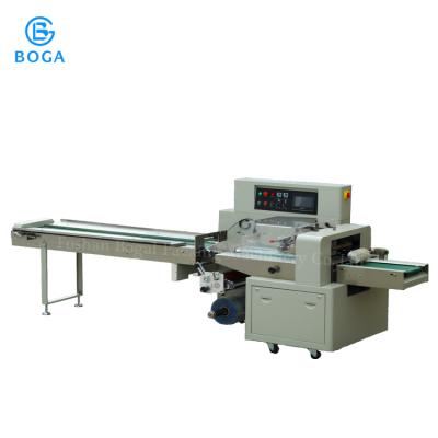 China CLOTHING China Flow Servo Motor Bag Packing Machine Irregular Shape Equipment For Food Products for sale