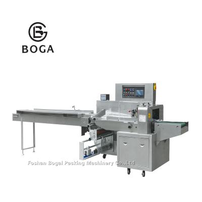 China Food 50 Pcs High Performance Automatic Mask Packaging Machine Automatic Medical Flow Pack Mask Packaging Machine for sale