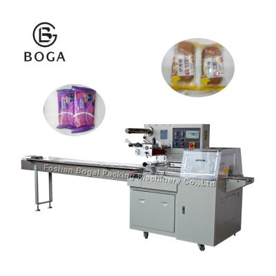 China CLOTHING Foshan Factory High Efficiency Packaging Machine Mask Packaging Machine Horizontal Faster Speed for sale