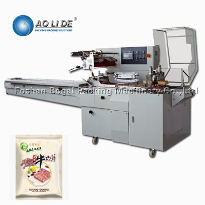 China Food factory pillow frozen chicken packing machineka video for sale