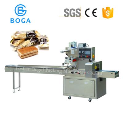 China APPAREL hot sale horizontal wrap tiramisu cake packaging machine price for sale