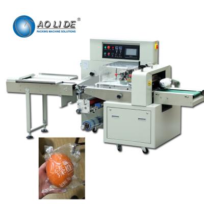 China Full Automatic Type Honeydew Cantaloupe Apricots Pears Clementines Fresh Fruit Orange Food Flow Packing Machine for sale