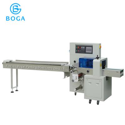 China CLOTHING Back Film Stationery Multifunctional Cartoon Flow Wrapper / Rubber Wrapping Machine Low Price for sale