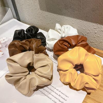 China Low Price Scrunchy PU Solid Colors Leather Elastic Hair Band Hair Band Wholesale Tie Accessory for sale