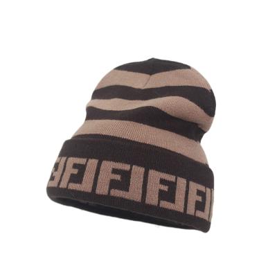 China breathable & New Waterproof Winter Fashion Brand Striped Designer Knitted Hat Sports Outdoor Warm Keeping Toque for sale