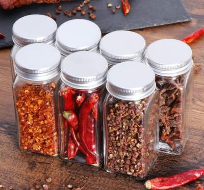 China Sustainable Clear Square Spice Bottles Glass 120ml Bottle For Spices Packing With Silver Lid Black Lid for sale