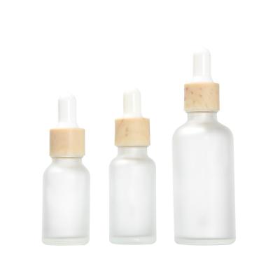 China Care Round Cylinder 20ml 30ml Personal Matte White Essential Oil Glass Dropper Bottle for sale