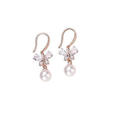 China Pure White Pearl Design Niche Earrings Butterfly Temperament Fungus Jewelery Pearl Design Wild Thin Female Red Net Korean FASHION Ear for sale