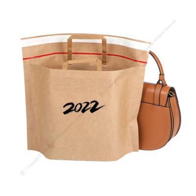 China New Trend Buying Tote Kraft Paper Bag Self Adhesive Paper Packaging Product Biodegradable Biodegradable Clothes for sale