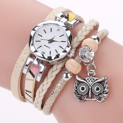 China Simple Fashion Women Dress Ladies Owl Multilayer Wristwatches Cute Retro Quartz Ladies Wrap Three Buckle Bracelet Watch for sale