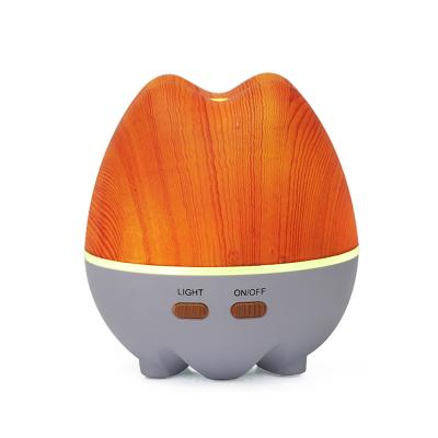 China Latest Ultrasonic Household Wooden Color Essential Oil Aroma Tender Electric Humidifier for sale