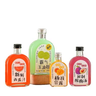 China Beverage Flask Flat Glass Juice Beverage Bottle Coffee Bottle With Sealed Lid for sale