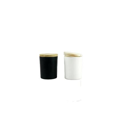 China Home Decoration Wholesale 12oz Black Round Scented Empty Unique Luxury Candle Container With Wooden Lid for sale