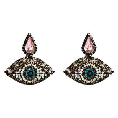 China Hot Selling Vintage Crystal Rhinestone Eye Stud Earrings Fashion Girl For Women Jewelry Accessories for sale