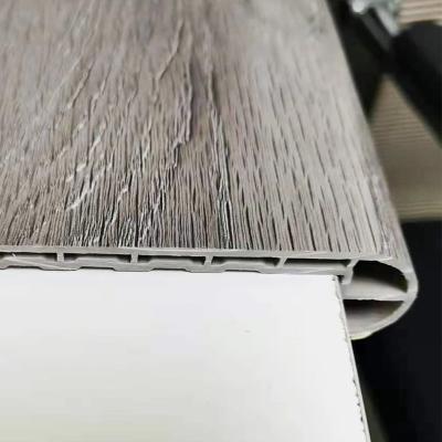 China Waterproof+Moistureprooof +mould proof decoration look floor skirting board SPC material wood stair nose for sale