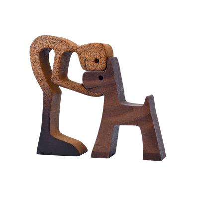 China Europe Wooden Dog Carving Small Decoration Figurines Decor Women And Dog Statue Wooden Home Decorations For Pet Lover Ornament Gift for sale