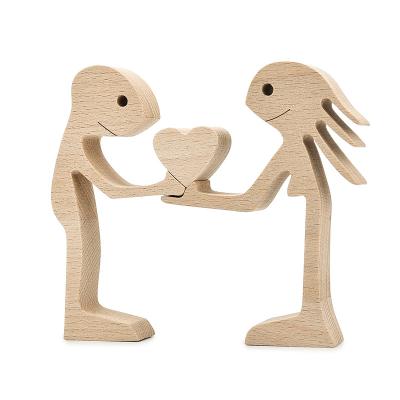 China Europe Unique Christmas Decoration Wooden Couple Carving Craft Table Decoration Diy Wood Craft for sale