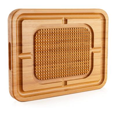 China 100% Sustainable Natural Bamboo Block Carving Board Thick Reversible Thick Butcher Serving Tray Anti Slip for sale