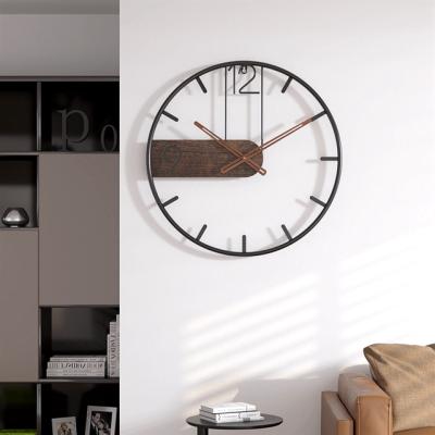 China Simple creative light luxury mute clock iron wall clock living room nordic antique hot sale fashion style home bedroom mute clock for sale