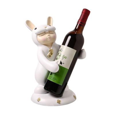 China Cute Europe Resin Ornaments Milk Rabbit Wine Rack Home Living Room Wine Cabinet Decoration Rack Housewarming Gift for sale