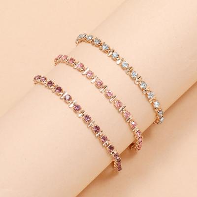 China FASHIONABLE Soft Pink Copper Foot Chain Claw Multi Layer Loop 3 Piece Artificial Crystal Tennis Anklet Set for sale