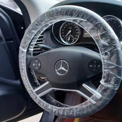 China Prevent Residue Of Oil Automobile Wheel Cover Disposable Plastic Steering Protective Plastic Sheet for sale