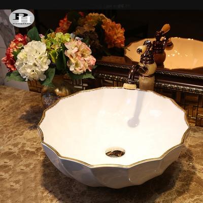 China Bathroom Contemporary Art China Lavatory Porcelain Ceramic White Wash Basin With Gold Color Rim for sale