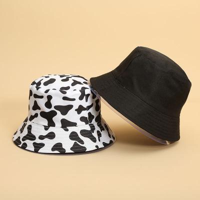 China COMMON Custom Popular Spring And Autumn Fisherman Hat Women Sunscreen Hat Cow Print Bucket Hats for sale