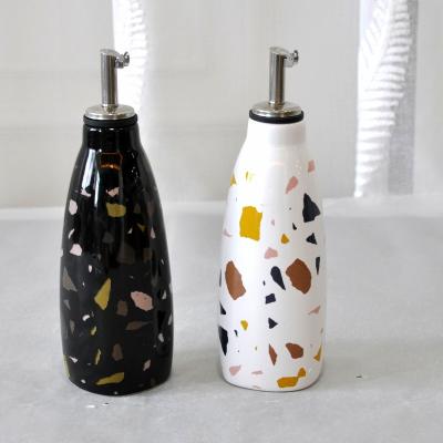 China JIA SHUN White And Black Ceramic Kitchen Sustainable House Hotel Beware Irregular Figures Decal Oil Vinegar Soy Sauce Bottle for sale