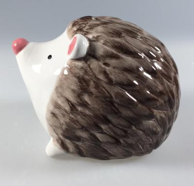 China Gifts Giving Hot Sales Hedgehog Animal Shape Piggy Banks Coin Banks for sale