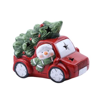 China Christmas Ornament Snowman LED Driving Car With Ceramic Christmas Tree Christmas Decoration Ornaments for sale