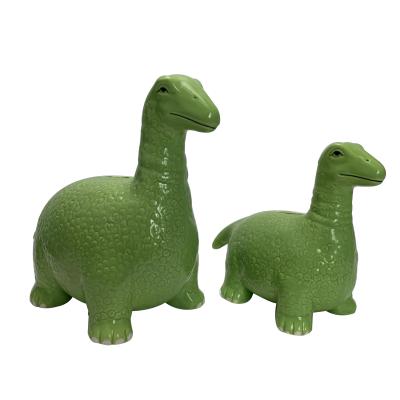 China Custom gift green dinosaur glazed ceramic piggy banks pawer toys piggy bank for sale