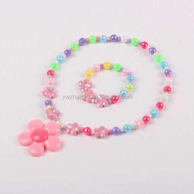 China TRENDY Fashion Plastic Flower Pendant Beads Elastic Necklace Kids Jewelry Set for sale